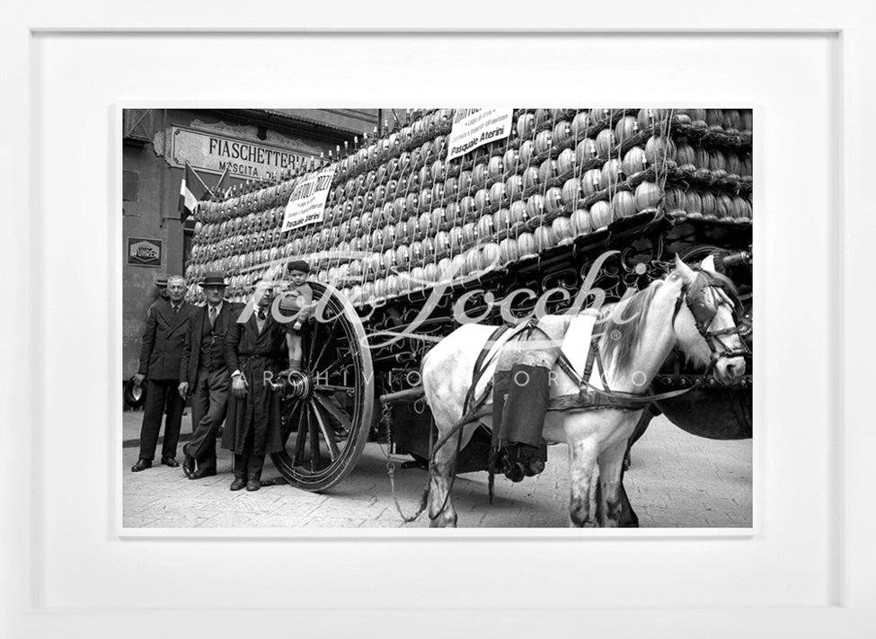 Cart with flasks of wine pulled by a horse