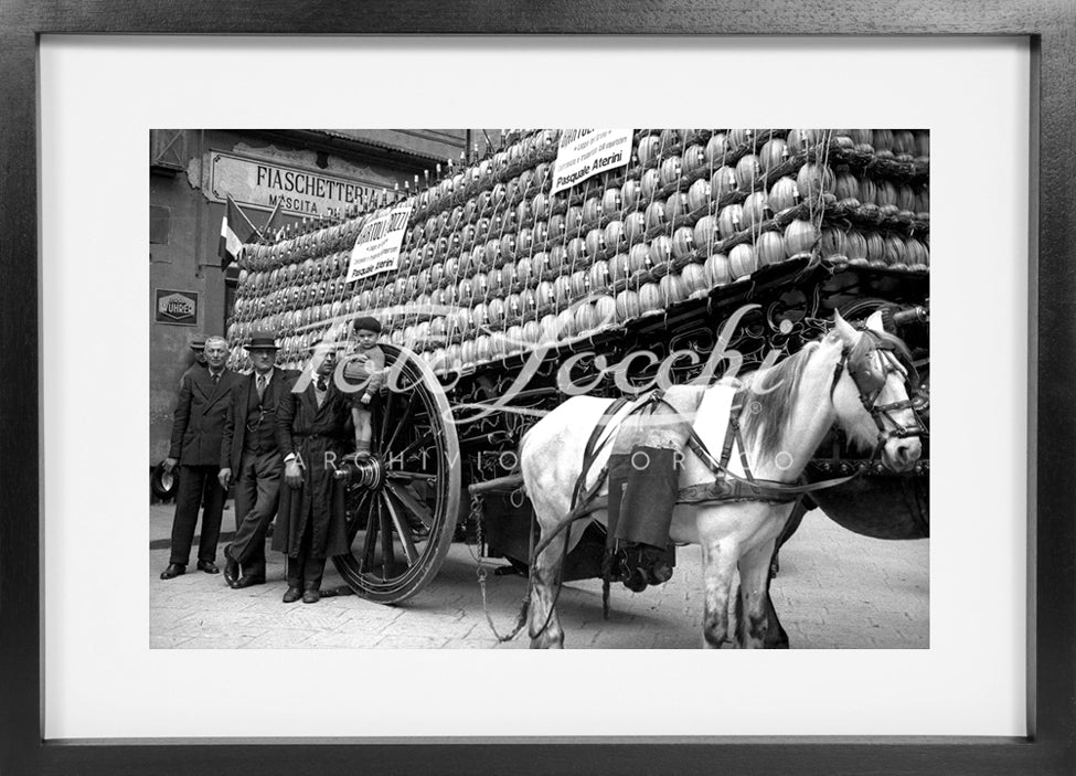 Cart with flasks of wine pulled by a horse
