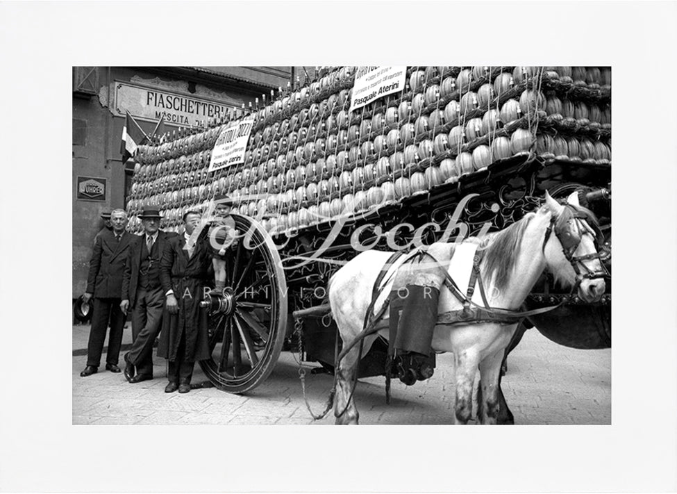 Cart with flasks of wine pulled by a horse