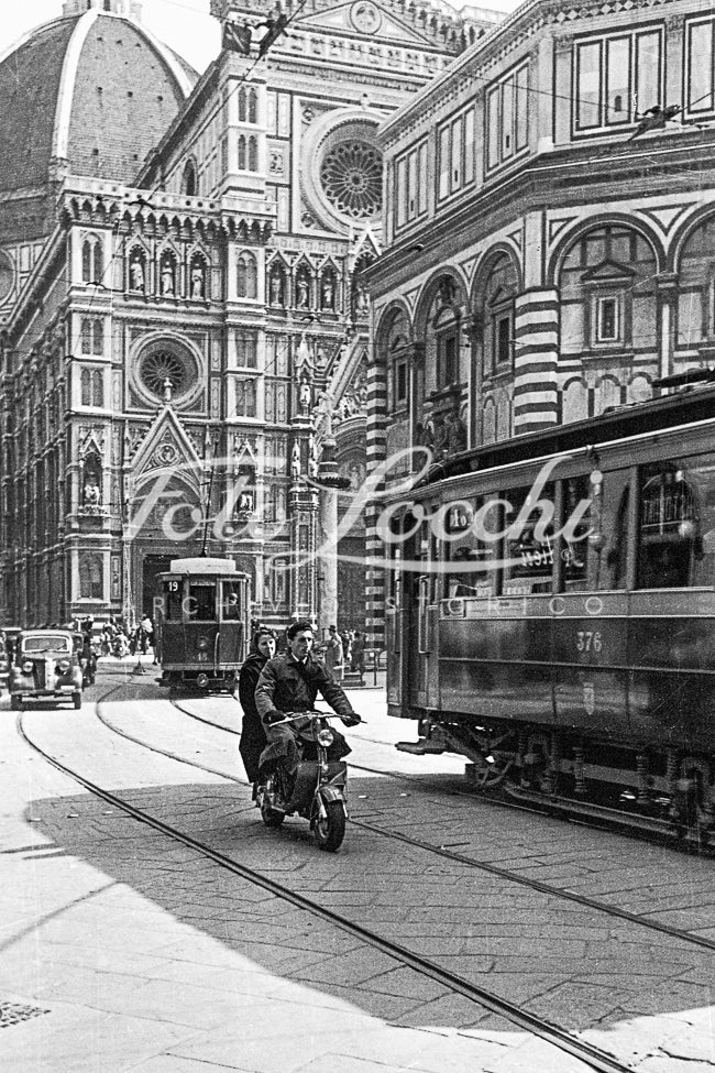 Lambretta and tram in Piazza del Duomo