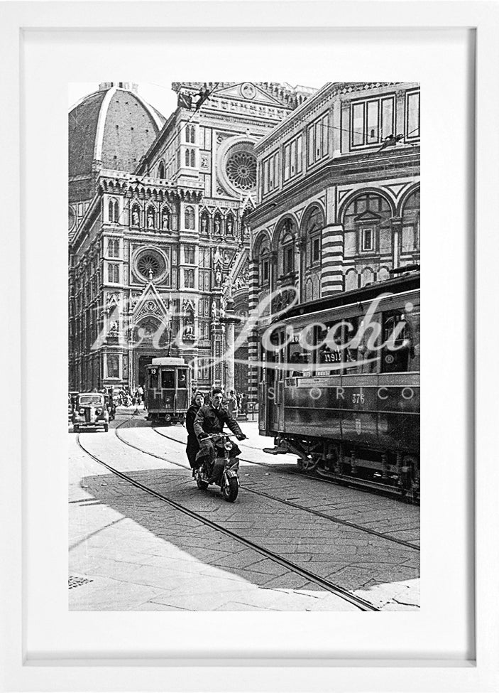 Lambretta and tram in Piazza del Duomo
