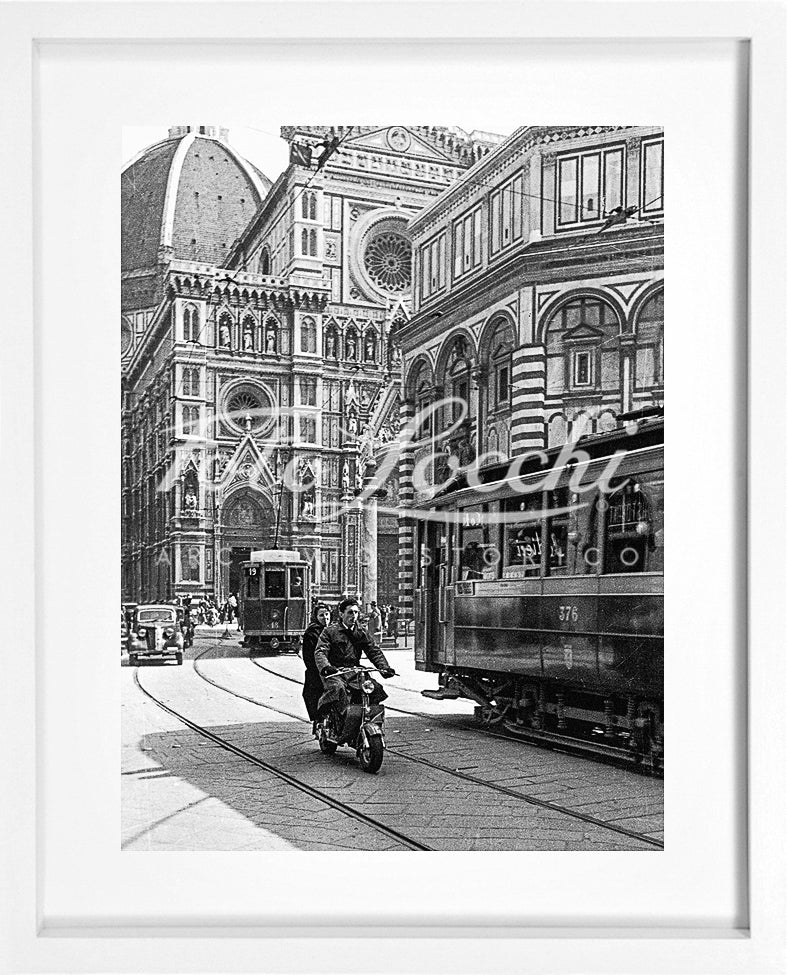 Lambretta and tram in Piazza del Duomo