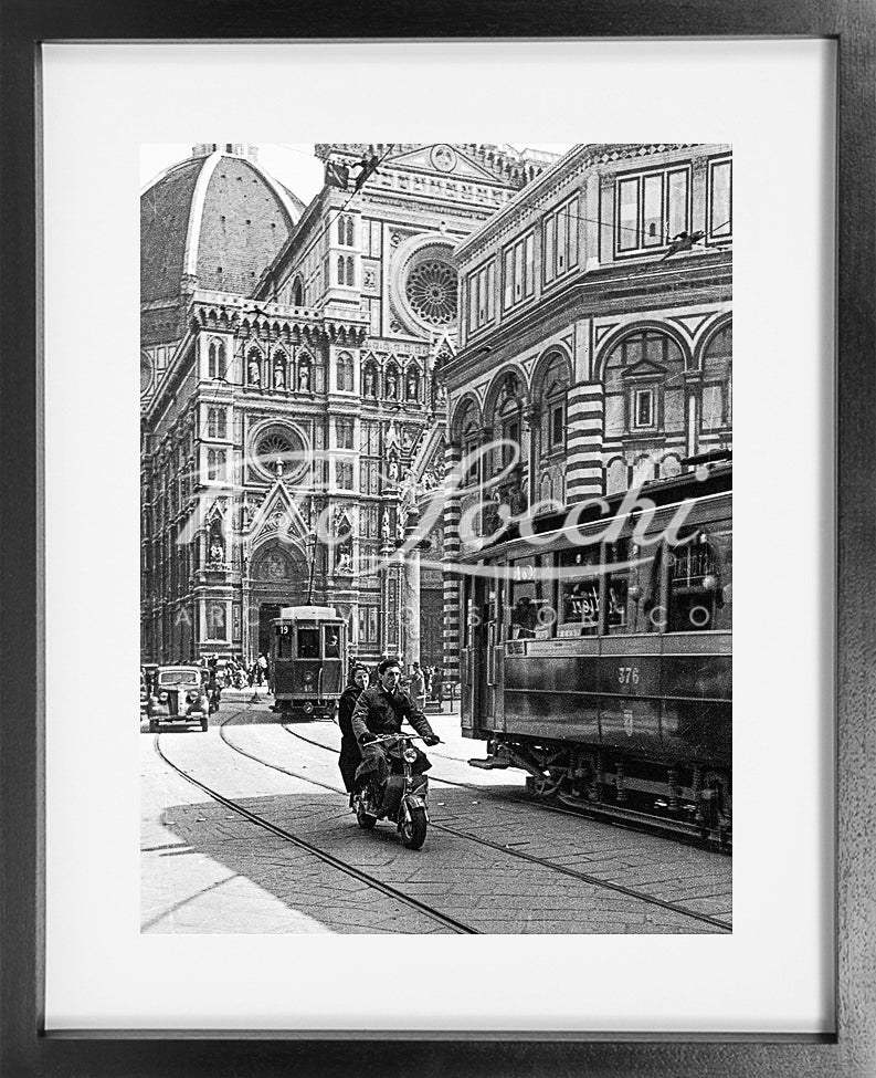 Lambretta and tram in Piazza del Duomo