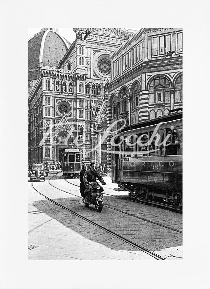 Lambretta and tram in Piazza del Duomo